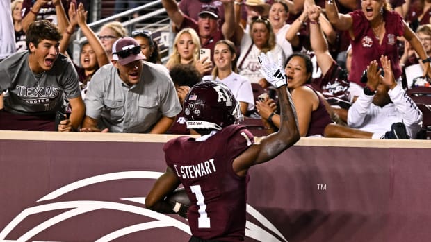 Texas A&M Aggies wide receiver Evan Stewart (1) waves to the fans after his touchdown during the third quarter New Mexico Lobos at Kyle Field.